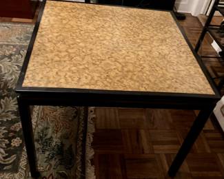Lovely table with black Asian style legs and burled wood veneer top.