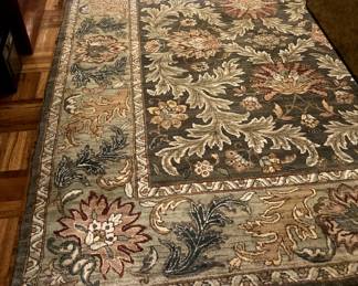 Lovely green and rose area rug
