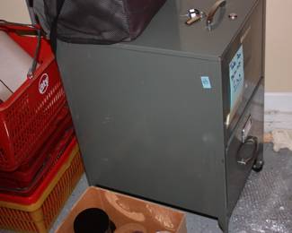 Metal 2 drawer file cabinet on castors