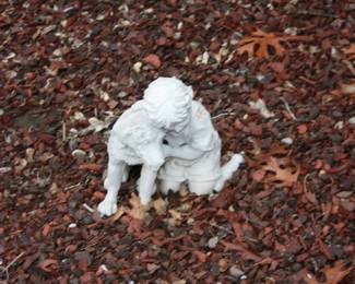 Yard art:  Girl w/dog