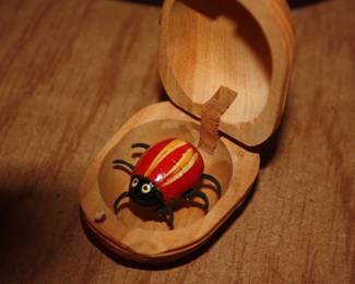 Wood carved walnut w/bug inside