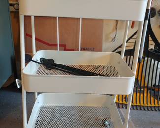 White metal 3 tier shelf w/rollers