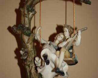 Cast:  Young boy & girl on swing