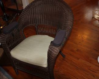 1 of 2 matching  brown wicker chairs
