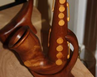 All hand carved instruments: Saxophone 