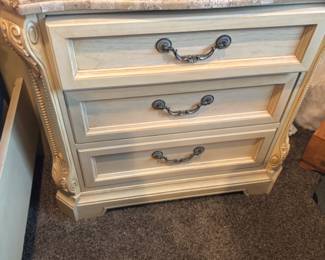 Matching nightstands with marble tops 