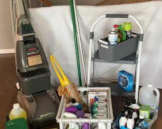 Hoover steam vac and other cleaning items.