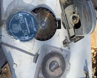 Old Circular Saw With Blades And Handsaws