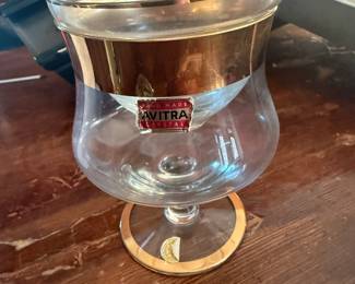 vintage Avitra crystal shrimp cocktail glass with a gold-tone rim and base.
The glassware features a separate inner liner for holding the cocktail and and shrimp