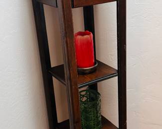 A mission oak grandfather clock with shelves