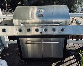 har-Broil gas grill, likely a model from the Performance or Classic series, which typically includes multiple burners and a side burner.