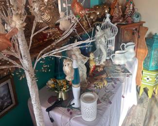 Beautiful Boho Art and Furniture. Lots of Southwest Paintings, Furniture and Figurines. European Antiques, Unique Christmas Decor/Ornaments, Kitchenware, Salt & Pepper Shakers, Lamps, Patio Furniture, Potted Plants, Linens, Decorative Throw Pillows, CDs, Dining Room Set, New Age Decor, Rugs. Polar Bear Figurines, Books, Glassware, Mirrors, Sofas, Shelving Units, TVs, Tiger/Big Cat Decor, Wolf Decor, Angel Decor, Signed Artwork, etc. Flexible pricing, willing to make deals.