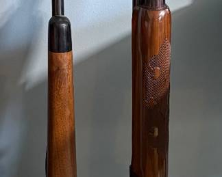 Remington 1100, 12 Ga., and a Bolt-Action Rifle and unknown shotgun