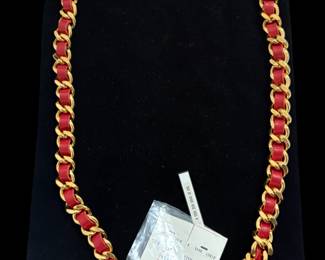 Vintage Chanel Red Leather & Gold-Tone Chain Belt / Necklace
Authentic vintage Chanel statement piece featuring rich red leather woven through a classic gold-tone chain. Finished with a CHANEL plaque and iconic round CC medallion charm, this versatile piece can be worn as a belt or styled as a bold necklace. Luxurious craftsmanship with substantial weight and elegant detailing, characteristic of Chanel’s early designs. A rare and timeless collectible, perfect for elevating both casual and dressy looks. Excellent vintage condition with original tag present.