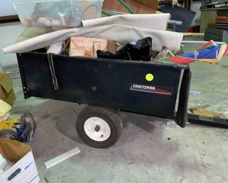 A nice cart that can go behind the lawnmower. It is for the craftsman riding lawnmower, but we are selling it separately.