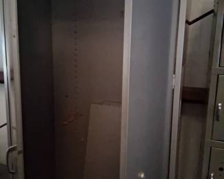 I know it’s a bad no light in this place. It is a two-door metal cabinet.