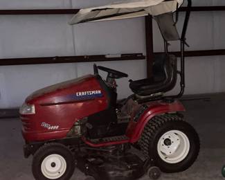 Another picture of the lawnmower with its canopy