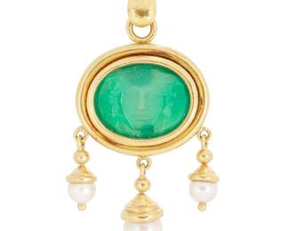 14
Elizabeth Locke: An 18K Gold, Green Glass and Cultured Pearl Pendant/Brooch
Featuring an oval green glass intaglio and mother-of-pearl doublet, suspending three tiers of round cultured pearls measuring approximately 6.00-8.50 mm, signed with maker's mark

Measures: 2 1/4 x 1 in.
20.7 grams gross
Estimate: $1,800 - $2,500
