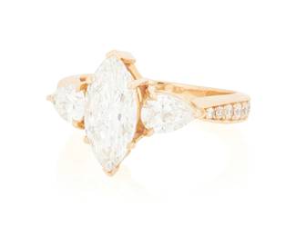 

Back to catalog
21
An 18K Rose Gold and Diamond Ring
Centering a marquise-shaped diamond weighing 1.75 carats, accented by two pear-shaped diamonds and a round diamond set shank weighing approximately 1.20 carats

Size: 7 3/4
5.0 grams gross

Accompanied by a GIA Report numbered #1236785128, dated November 12, 2025, stating the diamond as Natural with a color grade of D and a clarity grade of I2, no fluorescence.
Estimate: $3,500 - $5,500