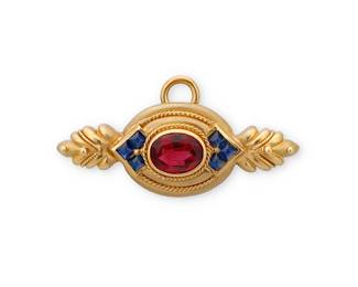 62
Joan Boyce: An 18K Gold and Gem-Set Brooch/Pendant
Centering an oval rubellite tourmaline weighing approximately 4.64 carats, accented by square sapphire cabochons all set in an ornate gold frame, signed JBS

Measures: 2 1/8 x 3/4 in.
19.0 grams gross
Estimate: $1,000 - $1,500