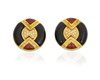 148
A Pair of 18K Gold, Gem-Set and Diamond Earrings
Of a circular design featuring onyx and garnet elements accented by round diamonds weighing approximately 0.22 carat, with Italian assay marks
2 pieces

measures: 3/4 x 3/4 in.
24.5 grams gross
Estimate: $1,200 - $1,800
