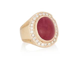 18
A Gold, Ruby and Diamond Ring
Centering an oval ruby cabochon weighing approximately 8.25 carats, encircled by round diamonds

Size: 4 1/4 with sizing spring
10.5 grams gross
Estimate: $3,000 - $5,000