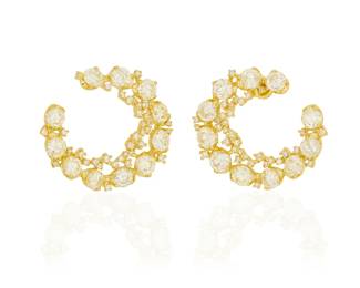 192
A Pair of 14K Gold and Diamond Earrings
Of a crescent design featuring round diamonds weighing approximately 7.80 carats
2 pieces

Measures: 1 x 1 in.
9.4 grams gross
Estimate: $3,000 - $5,000
