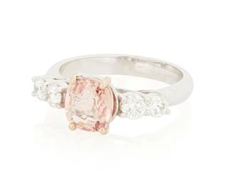 214
An 18K White Gold, Padparadascha Sapphire and Diamond Ring
Centering a pinkish orange sapphire weighing approximately 2.19 carats, accented by four round diamonds weighing approximately 0.65 carat

Size: 7 1/2
5.0 grams gross

Accompanied by a GIA Report numbered #5231779555, dated November 18, 2025, stating the Sapphire as natural Corundum Padparadascha with No heat enhancements.
Estimate: $3,000 - $5,000