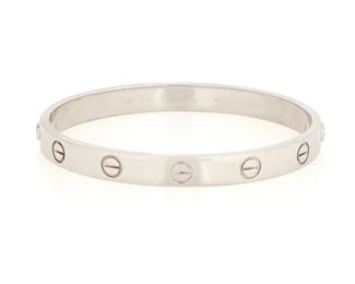 200
Cartier: An 18K White Gold 'Love' Bracelet
Featuring two screw point openings with additional crew motifs, signed Cartier, 1993 no. AE3980, 16, with original white screwdriver and box

Size: 6 in.
30.3 grams gross
Estimate: $4,500 - $6,500