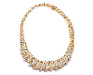 191
An 18K Bi-Color Gold and Diamond Necklace
Featuring an articulated foliate design accented by graduated round diamonds weighing approximately 7.50 carats

Length: 15 in.
73.7 grams gross
Estimate: $15,000 - $20,000