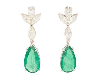 111
A Pair of 18K White Gold, Emerald and Diamond Earrings
Suspending two pear-shaped Zambian emeralds weighing approximately 10.20 carats total, accented by pear-shaped and marquise shaped diamonds weighing approximately 3.50 carats total
2 pieces

Measures: 1 5/8 in.
8.7 grams gross
Estimate: $12,000 - $18,000