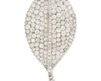31
Buccellati: A Platinum and Diamond Brooch
Of a leaf design featuring old mine-cut and single-cut diamonds weighing approximately 6.12 carats, signed M. Buccellati

Measures: 2 3/8 x 1 1/4 in.
17.0 grams gross
Estimate: $14,000 - $18,000