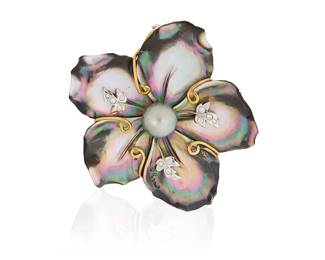 101
Piodoro: An 18K Bi-Color Gold, Abalone, Colored Cultured Pearl, and Diamond Enhancer
Featuring carved abalone in a floral design accented by round diamonds, centering a single grey cultured pearl measuring approximately 10.60 mm, signed J. Piodoro

Measures: 2 1/8 x 2 1/8 in.
34.4 grams gross
Estimate: $1,200 - $1,800