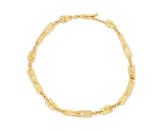196
Morelli: An 18K Gold Chain Necklace
Featuring geometric interlocking textured gold links, signed Morelli

Length: 16 in.
43.1 grams gross
Estimate: $4,500 - $5,500