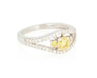 120
An 18K White Gold, Fancy Vivid Yellow Diamond and Diamond Ring
Centering a round brilliant-cut Fancy Vivid Yellow diamond weighing 0.54 carat, accented by round colorless and yellow diamonds

Size: 6 3/4
4.1 grams gross

Accompanied by a GIA Report numbered #16399186, dated May 14, 2008, stating the diamond as Natural with a color grade of Fancy Vivid Yellow.
Estimate: $1,500 - $2,500