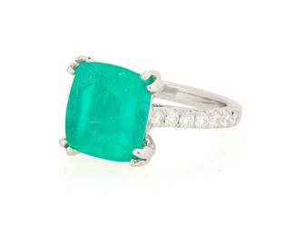 46
A Platinum, Emerald and Diamond Ring
Centering a cushion sugarloaf cabochon emerald weighing 3.82 carats, accented by round diamonds

Size: 4 1/2
5.7 grams gross

Accompanied by a GIA Report numbered #2193434576 dated June 18, 2018, stating the Emerald is natural Beryl of Colombian origin with clarity enhancements (F1).
Estimate: $3,000 - $5,000