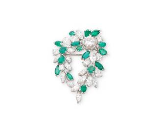 49
A Platinum, Emerald and Diamond Pendant/ Brooch
Of a cascading design featuring pear-shaped, round and marquise-shaped emeralds, accented by marquise-shaped, pear-shaped and round diamonds weighing approximately 6.25 carats

Measures: 1 3/4 x 1 1/4 in.
13.6 grams gross
Estimate: $5,000 - $7,000
