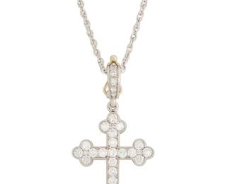 217
A Platinum and Diamond Cross Necklace
Set with round diamonds weighing approximately 1.00 carat


Chain: 16 in., Pendant: 1 1/4 x 3/4 in.
7.34 grams gross
Estimate: $1,500 - $2,500