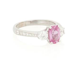 135
An 18K White Gold, Pink Sapphire and Diamond Ring
Centering an oval pink sapphire weighing approximately 1.47 carats accented by round diamonds weighing approximately 0.65 carat

Size: 7
4.94 grams gross

Accompanied by a GIA Report numbered #1232779551, dated November 18, 2025, stating the Sapphire as natural Corundum with heat treatment.
Estimate: $1,500 - $2,000