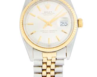 259
Rolex: A Stainless-Steel 'Datejust' Watch
Dial: 30.00 mm, round white dial with baton hour markers
Model: Datejust 1601
Case: 36.00 mm
Case number: 1576 movement, 1847247 serial
Closure: two tone link bracelet with deployment clasp
Signed:dial, movement and clasp with signed box

Inner circumference: 7 1/4 in.
95. 1 grams gross
Estimate: $3,000 - $5,000