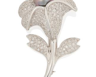 117
An 18K White Gold, Colored Cultured Pearl and Diamond Brooch
Of a flower design centering a drop-shaped gray cultured pearl, accented by pave-set diamonds weighing approximately 3.17 carats

Measures: 2 1/4 x 1 1/4 in.
22.0 grams gross
Estimate: $2,500 - $3,500