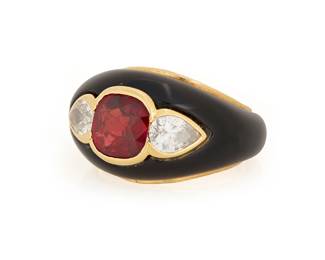 147
An 18K Gold, Onyx and Ruby Ring
Featuring a cushion brilliant-cut ruby weighing approximately 2.86 carats, accented by two pear-shaped diamonds weighing approximately 0.95 carat, all set in a half bezel of 18k gold and carved black onyx

Size: 5
11.1 grams gross

Accompanied by a GIA Report numbered #2235747325, dated October 11, 2025, stating the Ruby as natural Corundum of East Africa origin with no enhancements.
Estimate: $3,000 - $5,000
