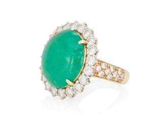 110
A Gold, Emerald and Diamond Ring
Centering an oval emerald cabochon weighing approximately 10.90 carats, encircled by round diamonds weighing approximately 1.60 carats

Size: 4 3/4 with sizing spring
12.7 grams gross
Estimate: $4,000 - $6,000