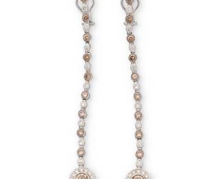 236
A Pair of 18K White Gold, Colored Diamond and Diamond Earrings
Centering two round brown diamonds weighing approximately 0.50 carat each suspending by a long tassel set with alternating round brown and near-colorless diamonds weighing approximately 3.50 carats
2 pieces

Measures: 3 x 3/8 in.
10.2 grams gross
Estimate: $2,000 - $3,000