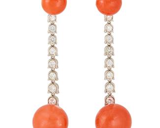 156
A Pair of Platinum Coral, and Diamond Earrings
Featuring four button-shaped coral measuring approximately 10.4 - 15.0 mm, featuring sixteen round diamonds weighing approximately 1.60 carats set in tulip style links
2 pieces

Measures: 2 1/2 x 1/2 in.
22.3 grams gross
Estimate: $12,000 - $18,000