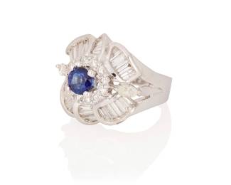 124
An 18K White Gold, Sapphire and Diamond Ring
Centering a round sapphire weighing approximately 0.85 carat accented by round, baguette and marquise-shaped diamonds weighing approximately 2.00 carats

Size: 6 1/2
13.1 grams gross
Estimate: $2,000 - $3,000
