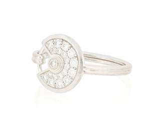 201
Cartier: An 18K White Gold and Diamond 'Amulette de Cartier' Ring
Featuring a 'C' design set with round diamonds weighing approximately 0.77 carat, signed Cartier, 53, can100

Size: 5 1/2
3.7 grams gross
Estimate: $2,000 - $3,000