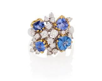 232
An 18K Bi-Color Gold, Sapphire and Diamond Ring
Featuring four heart-shaped sapphires weighing approximately 3.08 carats accented by a cluster of round diamonds weighing approximately 1.11 carats

Size: 7
7.9 grams gross
Estimate: $2,500 - $3,500