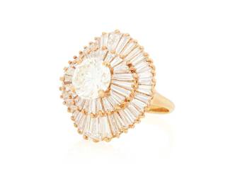 184
An 18K Gold and Diamond Ring
Centering a round diamond weighing 2.05 carats, set in a ballerina style mount accented by tapered baguette diamonds weighing approximately 3.20 carats

Size: 4 3/4
8.2 grams gross

Accompanied by a GIA Report numbered #2233784540, dated November 12, 2025, stating the diamond as Natural with a color grade of N and a clarity grade of VVS2, no fluorescence.
Estimate: $3,500 - $5,500