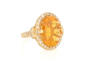 142
A 14K Gold, Fire Opal and Diamond Ring
Featuring an oval fire opal measuring approximately 16.18 x 11.97 x 8.27 mm, encircled by round diamonds weighing approximately 0.69 carats

Size: 6 3/4
8.8 grams gross
Estimate: $2,000 - $3,000